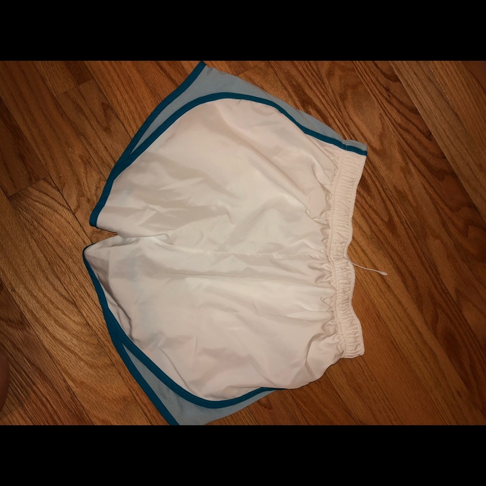 White and blue nike shorts